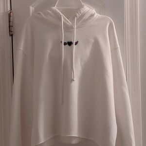 Hollister Womens White Cropped Hoodie with Heart and Wings Motif
